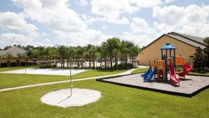 a park with a playground with a slide at Top Villas - Paradise Palms Resort 280 in Kissimmee