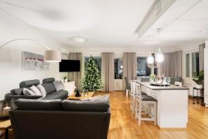 Posezení v ubytování Aurora Sky Apartment