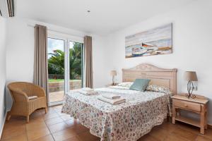 A bed or beds in a room at Villa La Martina