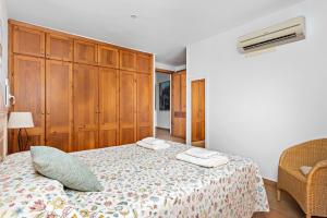 A bed or beds in a room at Villa La Martina