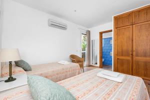 A bed or beds in a room at Villa La Martina