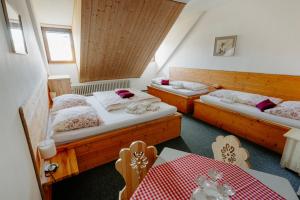 Postel nebo postele na pokoji v ubytování SOVA Hotel&Restaurant