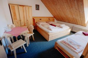 Postel nebo postele na pokoji v ubytování SOVA Hotel&Restaurant
