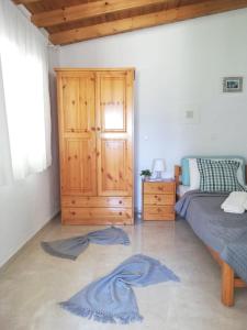 A bed or beds in a room at Semeli Ancient Stagira 4 Apts Chalkidiki