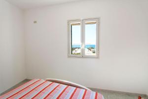 Ένα ή περισσότερα κρεβάτια σε δωμάτιο στο Villa Lata