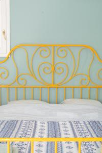 Ένα ή περισσότερα κρεβάτια σε δωμάτιο στο Lemon Tree Family House