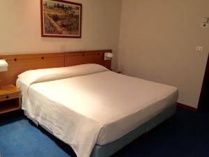 Krevet ili kreveti u jedinici u okviru objekta Hotel Barsotti
