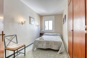 A bed or beds in a room at Avda de Rhode 229 Roses - Immo Barneda