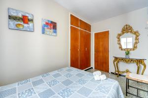A bed or beds in a room at Avda de Rhode 229 Roses - Immo Barneda