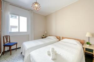Postel nebo postele na pokoji v ubytování Avda de Rhode 229 Roses - Immo Barneda