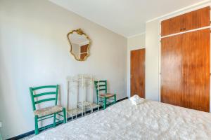 A bed or beds in a room at Avda de Rhode 229 Roses - Immo Barneda