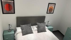 Cama o camas de una habitación en LOFT URBANO