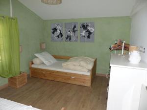 a bedroom with a bed in a room at Le Murmure des Cèdres - Gîte en Cévennes in Saint-André-de-Majencoules