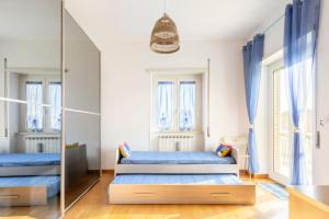 Ένα ή περισσότερα κρεβάτια σε δωμάτιο στο InClanto Beach House, mare a 150 mt