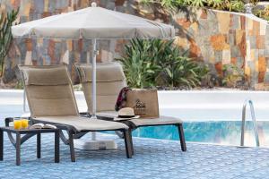 The swimming pool at or close to MUR Apartamentos Buenos Aires Gran Canaria