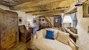Posteľ alebo postele v izbe v ubytovaní Ca' Scocc, antica casa di montagna in Valsesia