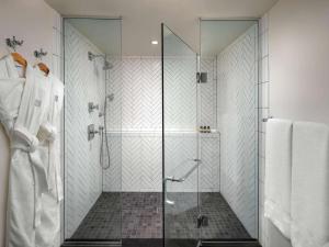 a bathroom with a shower with a glass door at Fairmont Sonoma Mission Inn & Spa in Sonoma
