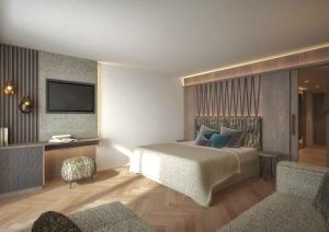 a rendering of a bedroom with a bed and a tv at Majestic Hotel & Spa Resort in Brunico