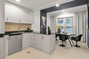 Kuchyň nebo kuchyňský kout v ubytování The Smart Concierge - Elite residence