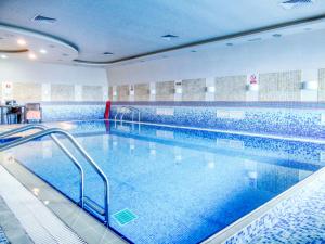 Bazén v ubytování The Smart Concierge - Elite residence nebo v jeho okolí