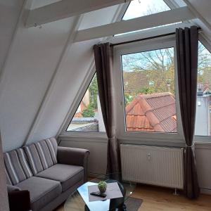 Ein Sitzbereich in der Unterkunft Alt-Emder Bürgerhaus