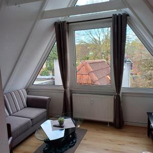 Ein Sitzbereich in der Unterkunft Alt-Emder Bürgerhaus