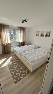 Ein Bett oder Betten in einem Zimmer der Unterkunft Gemütliches Ferienhaus Küstennähe