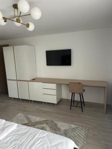 Μια τηλεόραση ή/και κέντρο ψυχαγωγίας στο CIU & BIU Apartament