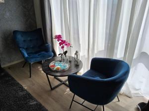 Posezení v ubytování Chambre deluxe au 2ème étage, chambre double au 4ème étage NOT A HÔTEL