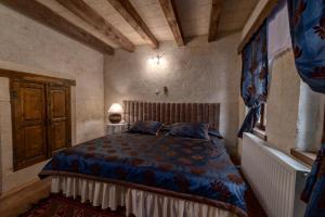 Postel nebo postele na pokoji v ubytování Hotel Temenni Evi