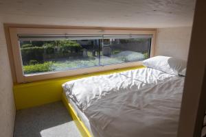 Postelja oz. postelje v sobi nastanitve MOBILE HOMES direkt am Strand des Neusiedler Sees