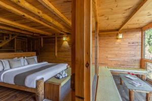 Postel nebo postele na pokoji v ubytování ELIVAAS 3 BHK Cottage with Garden & Sauna - Silvana