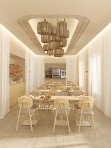 Restaurace v ubytování Hotel Gounod Fully Renovated