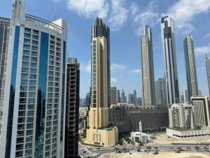 Nespecifikovaný výhled na destinaci Dubaj nebo výhled na město při pohledu z apartmánu