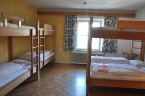 Voodi või voodid majutusasutuse Hotel Schwarzer Adler Sillian toas