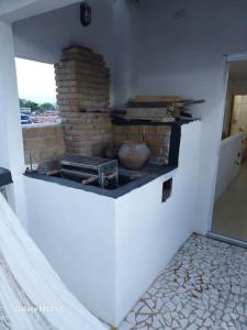 A cozinha ou cozinha compacta de Studio com varanda - Melhor localização do Arruda