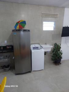 A cozinha ou cozinha compacta de Studio com varanda - Melhor localização do Arruda