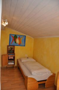 Voodi või voodid majutusasutuse Hotel Schwarzer Adler Sillian toas