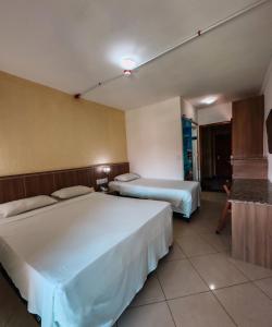 Postel nebo postele na pokoji v ubytování Hotel Beach Hills