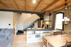 Posezení v ubytování Cal Rus Apartament 3