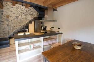 Kuchyň nebo kuchyňský kout v ubytování Cal Rus Apartament 3