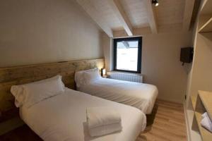 Postel nebo postele na pokoji v ubytování Cal Rus Apartament 3