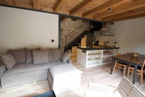 Posezení v ubytování Cal Rus Apartament 3
