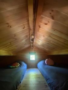 Postel nebo postele na pokoji v ubytování Le Chalet avec jacuzzi privatif