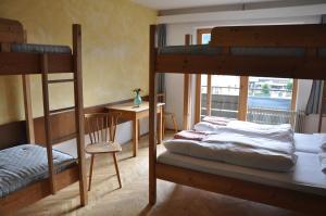 Voodi või voodid majutusasutuse Hotel Schwarzer Adler Sillian toas