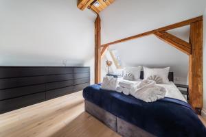 Posteľ alebo postele v izbe v ubytovaní H Aparthotel