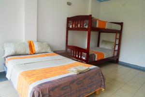 Letto o letti in una camera di Hotel Canoa´s Wonderland