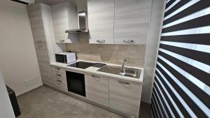Kuchyň nebo kuchyňský kout v ubytování Residenza Novi