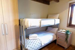 Posteľ alebo postele v izbe v ubytovaní Apartament l'Oreneta