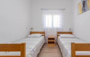 Postel nebo postele na pokoji v ubytování Stunning Apartment In Maslenica